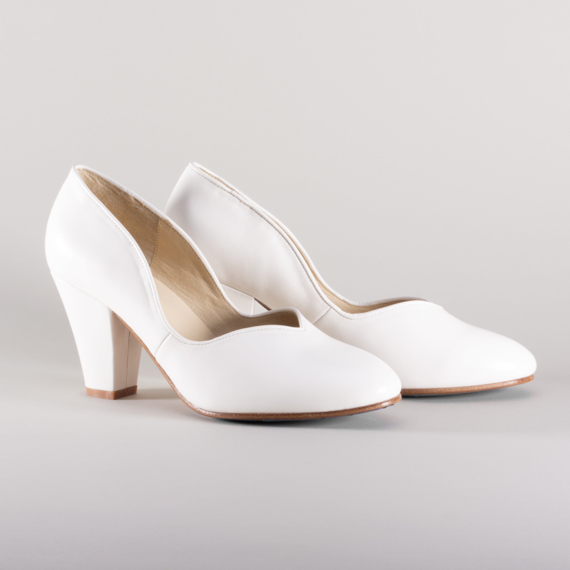 womens ivory pumps